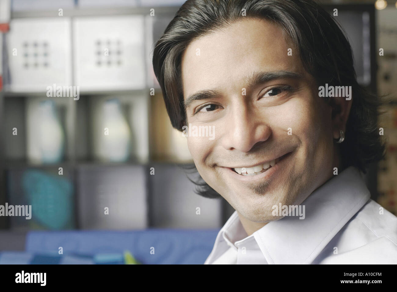 Portrait of a young man smiling Stock Photo - Alamy