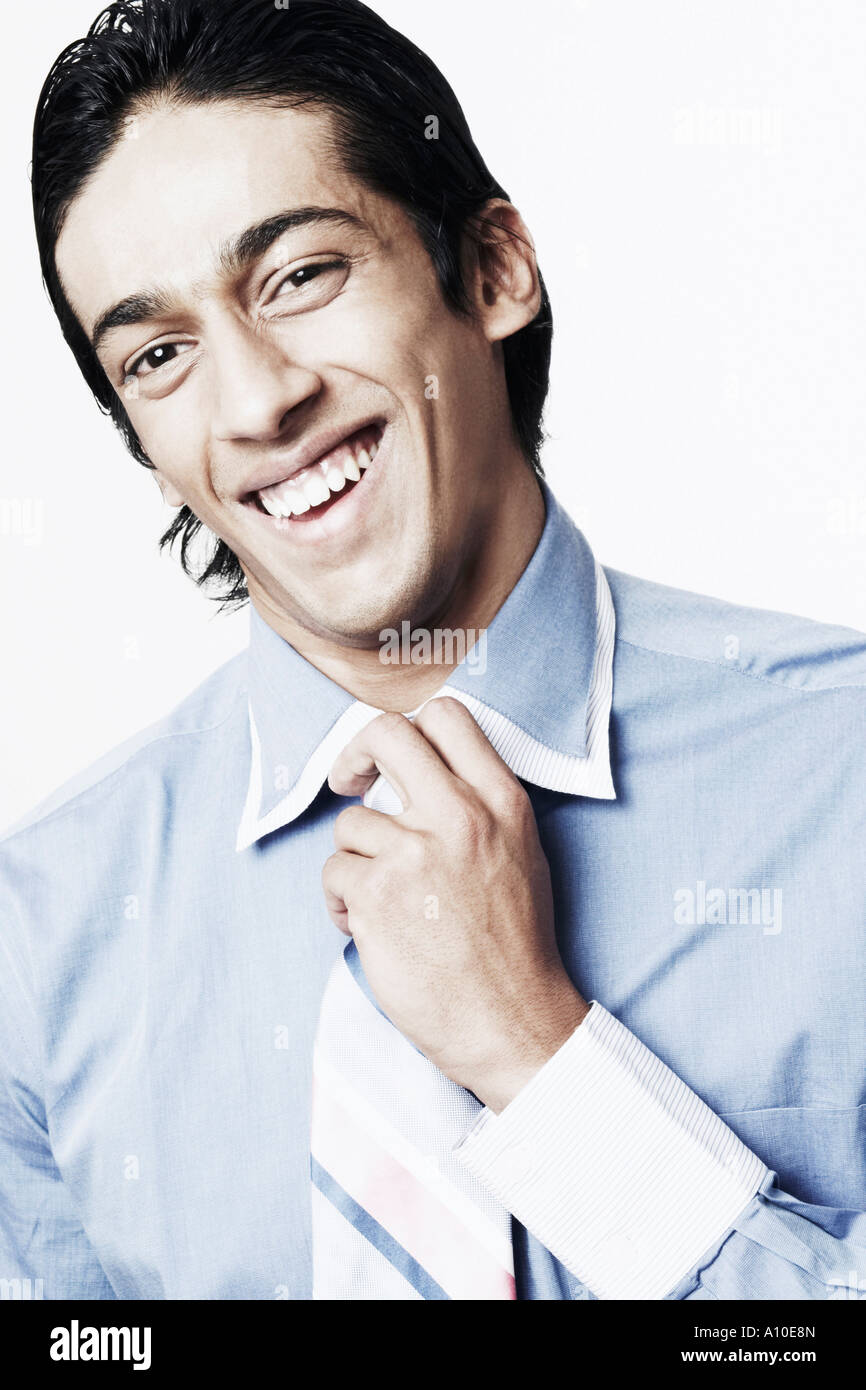 Portrait of a young man smiling Stock Photo - Alamy