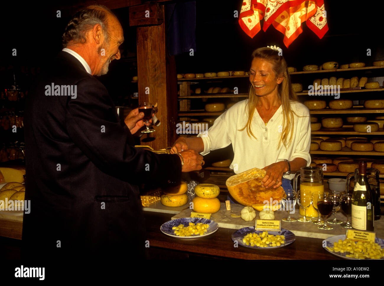 Dutch woman , serving cheese, Clara Maria Cheese Farm and Clog Factory, Amstelveen, Holland, Netherlands Stock Photo