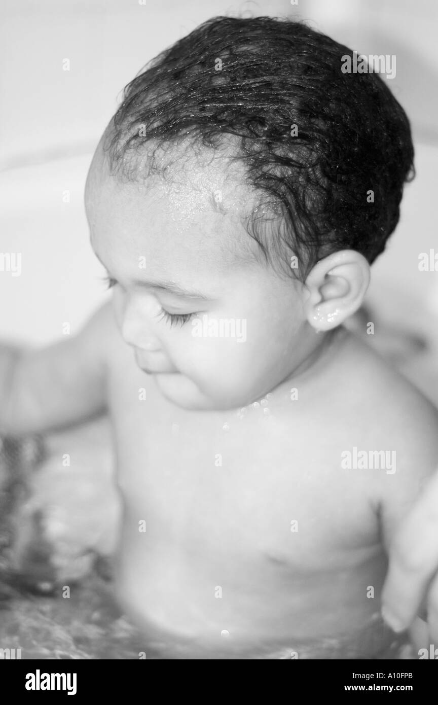 Baby bath african american Black and White Stock Photos & Images Alamy