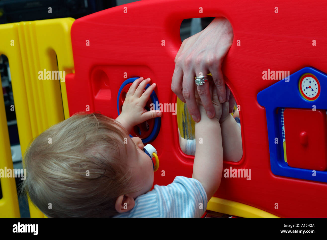 Boy grabs mother s hand Model released image caucasians white families ...