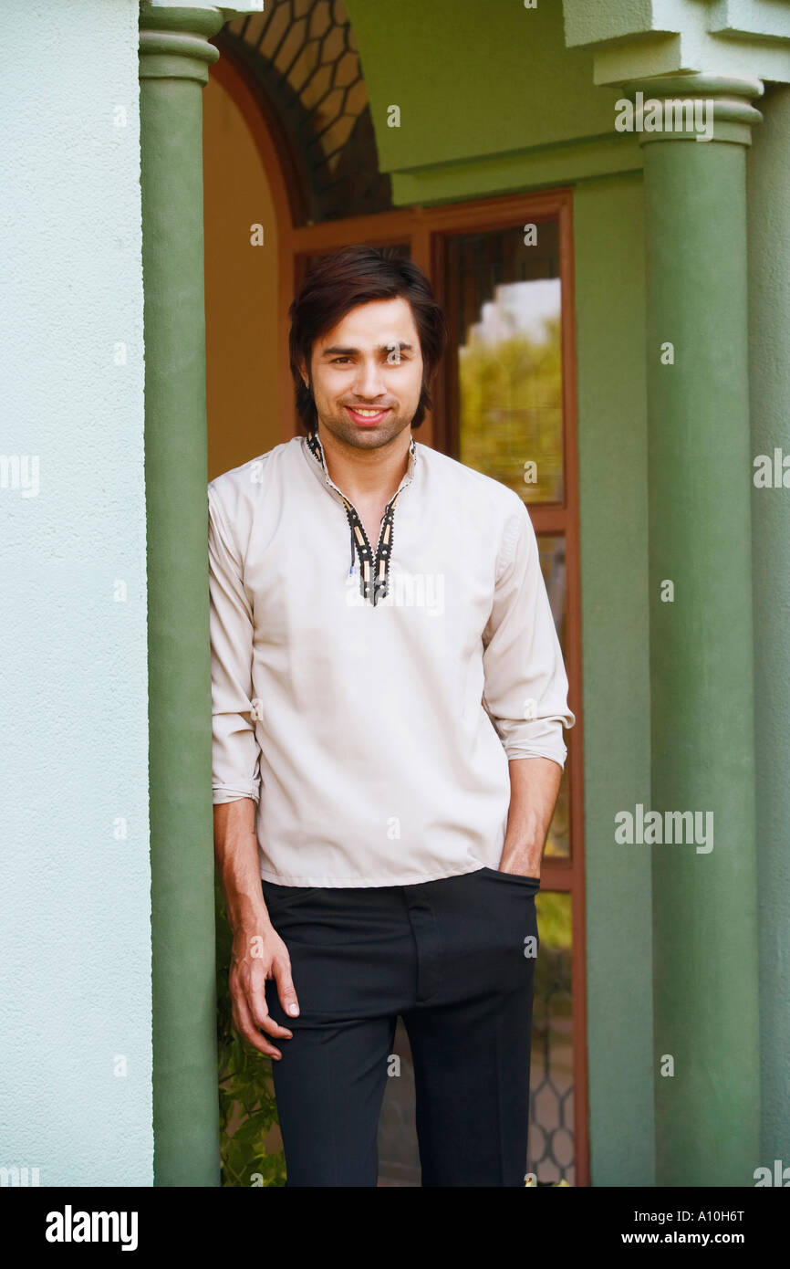 Portrait of a young man smiling Stock Photo - Alamy