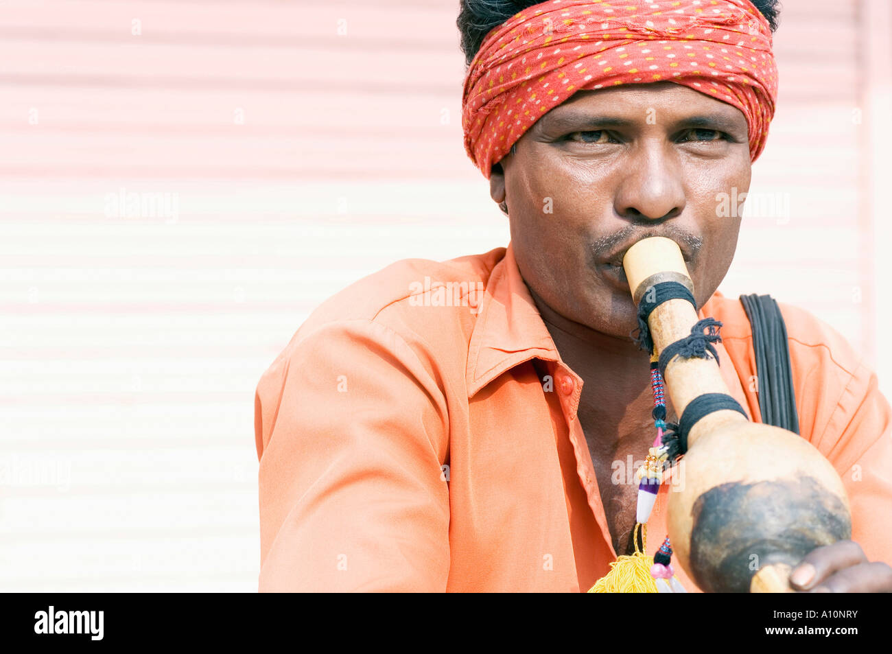 Closeup of a snake charmer playing a wind instrument, Jaipur, Rajasthan, India Stock Photo Alamy