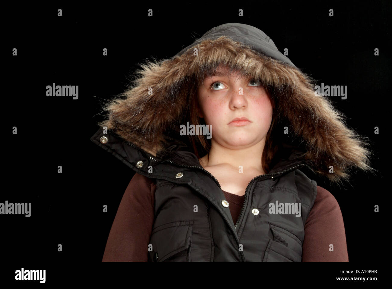 teenage girl with attitude and a fur lined hood Stock Photo