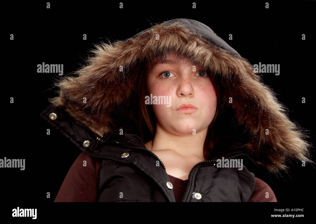 teenage girl with attitude and a fur lined hood Stock Photo