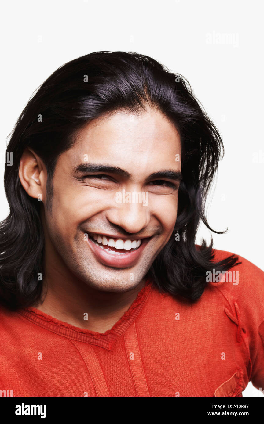 Portrait of a young man smiling Stock Photo - Alamy