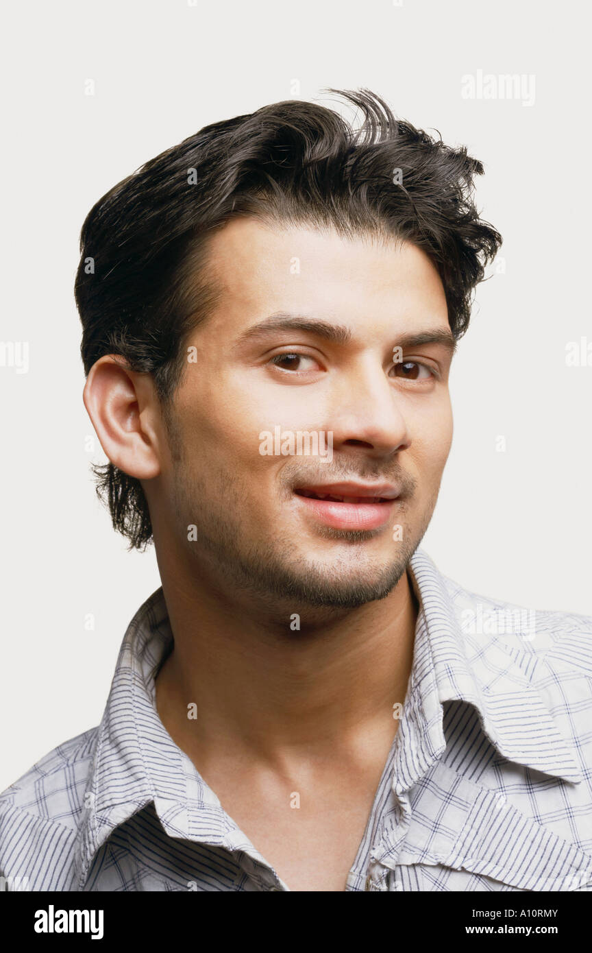 Portrait of a young man smiling Stock Photo - Alamy