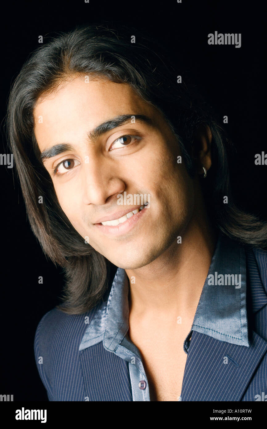 Portrait of a young man smiling Stock Photo - Alamy