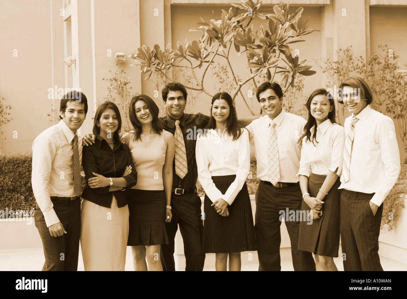 Portrait of a group of business executives smiling Stock Photo - Alamy