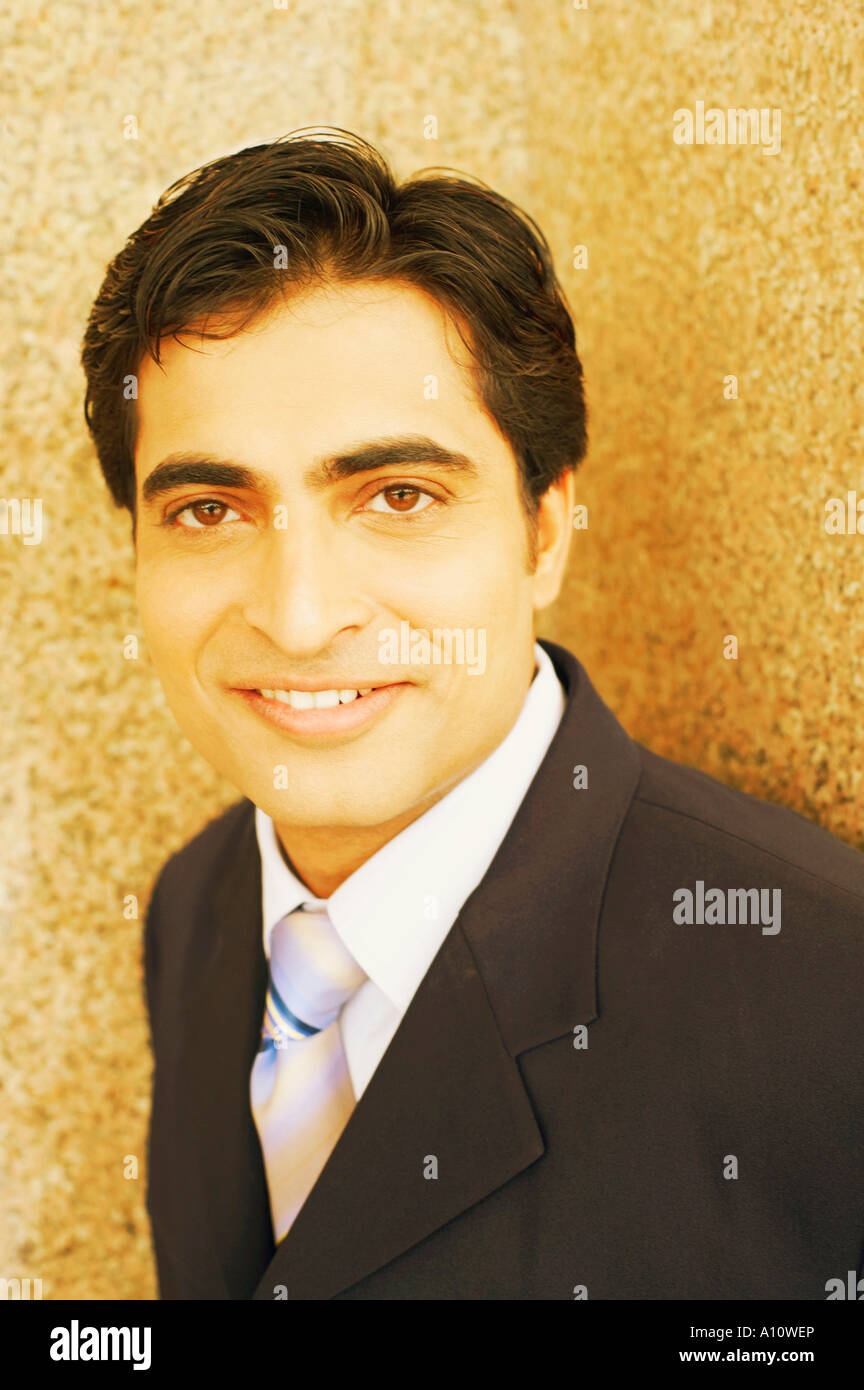 Portrait of a businessman smiling Stock Photo - Alamy
