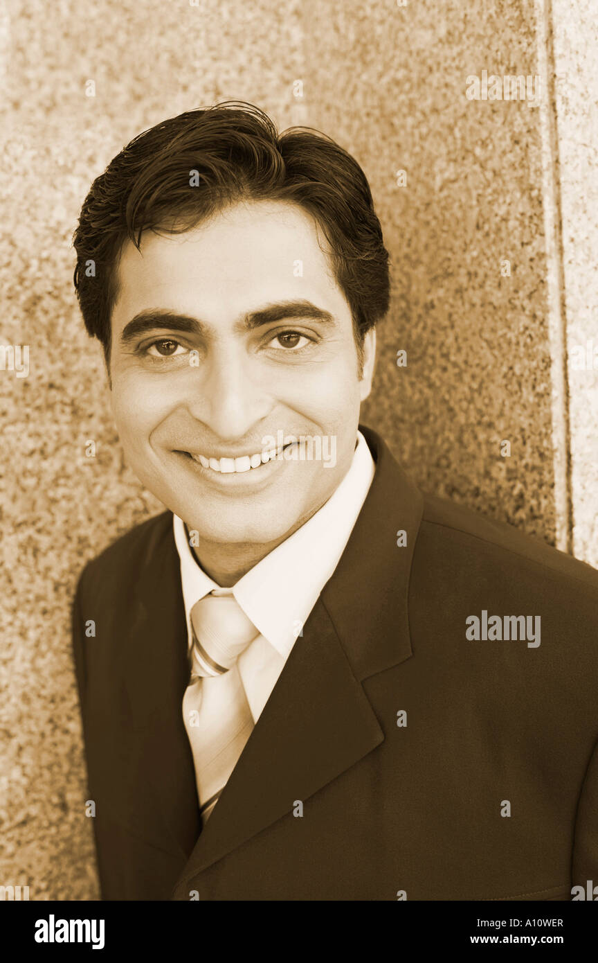 Portrait of a businessman smiling Stock Photo - Alamy