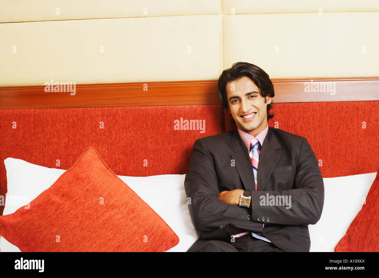 Portrait of a businessman smiling Stock Photo - Alamy