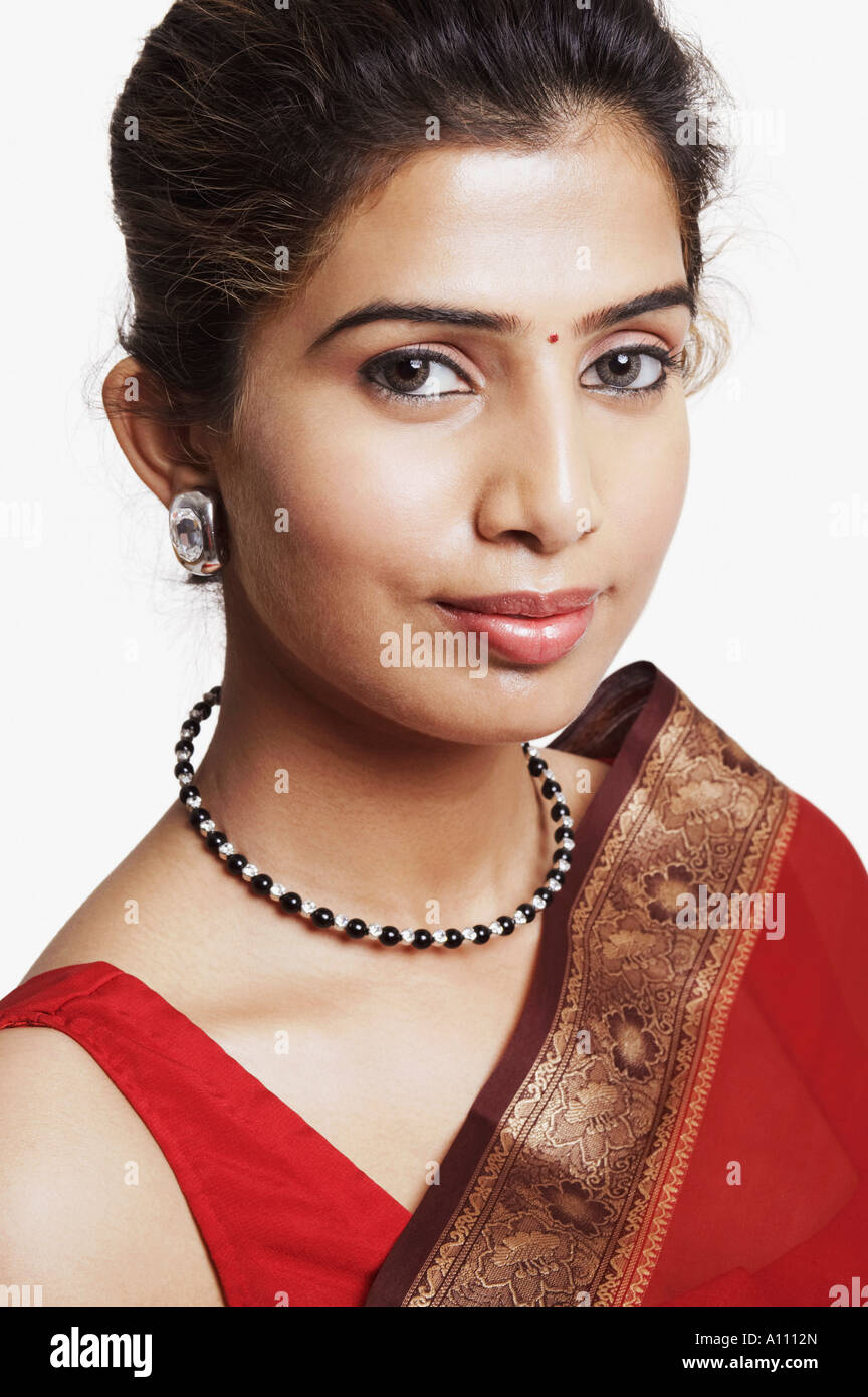 Portrait of a young woman wearing a sari Stock Photo - Alamy