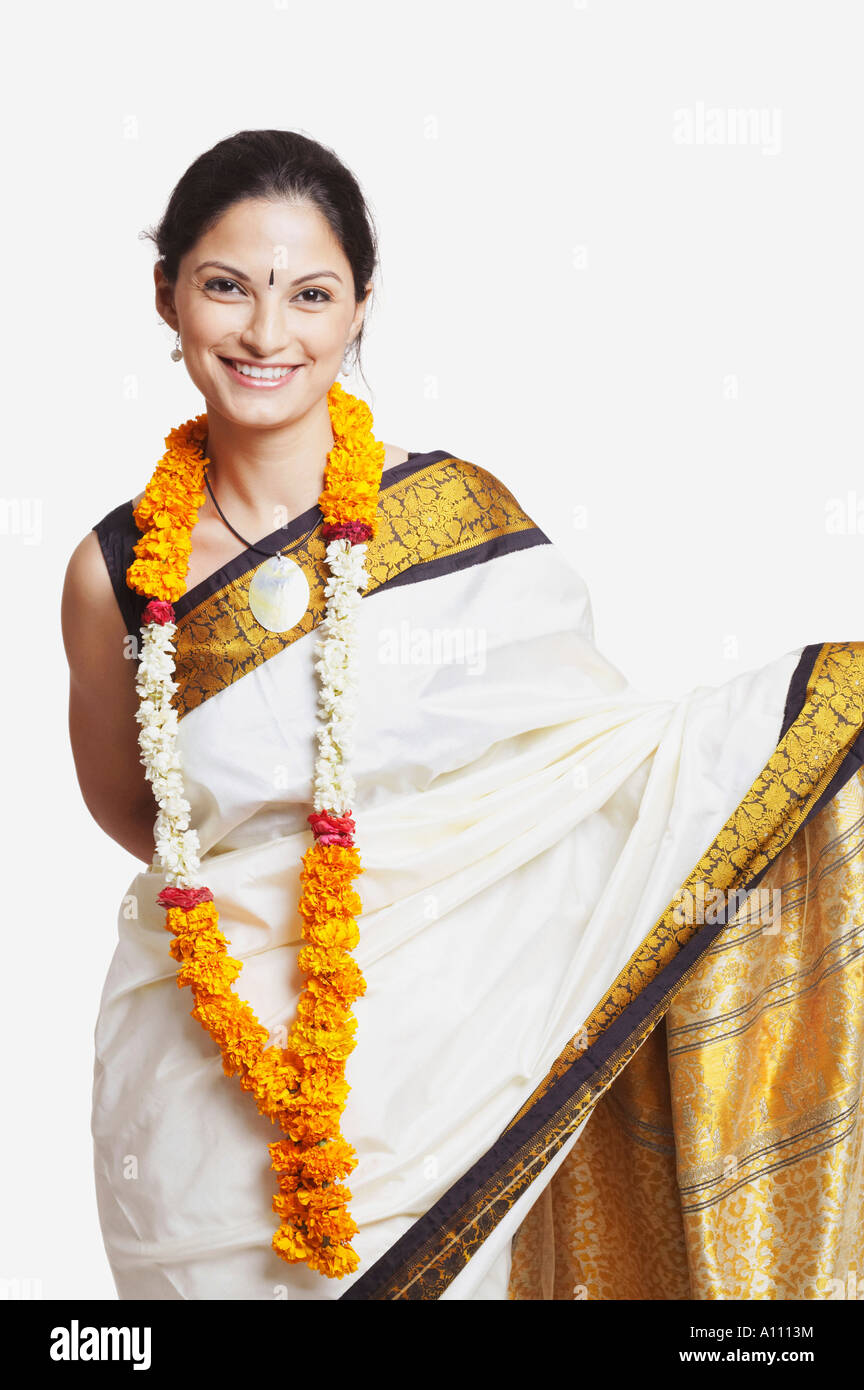 Portrait of a young woman wearing a sari Stock Photo - Alamy
