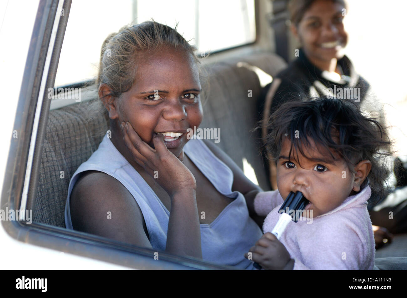 An aboriginal woman and her baby Anangu Pitjantjara lands South Australia Stock Photo