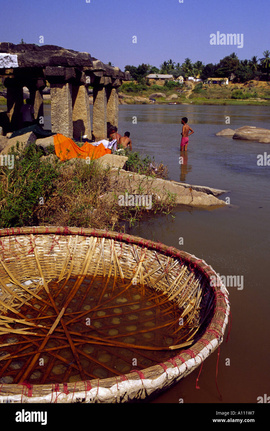 Coracle boat for river crossing in Hampi South India Stock Photo - Alamy