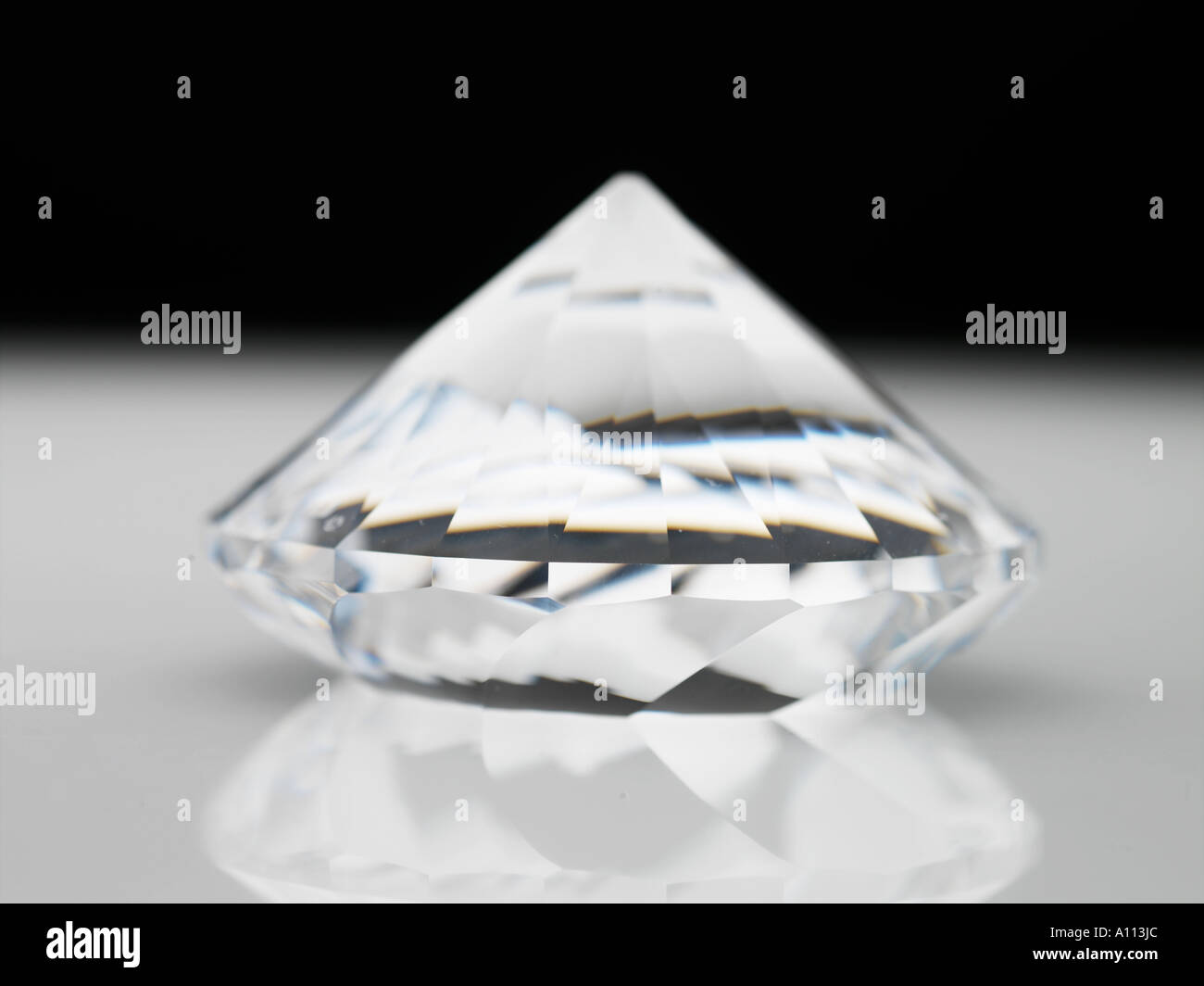 diamond prism shimmering, transparent, smooth, glass, delicate, heavy