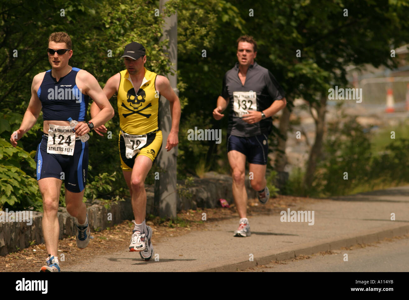 male triathletes competing in the Bala Middle Distance Triathlon Stock