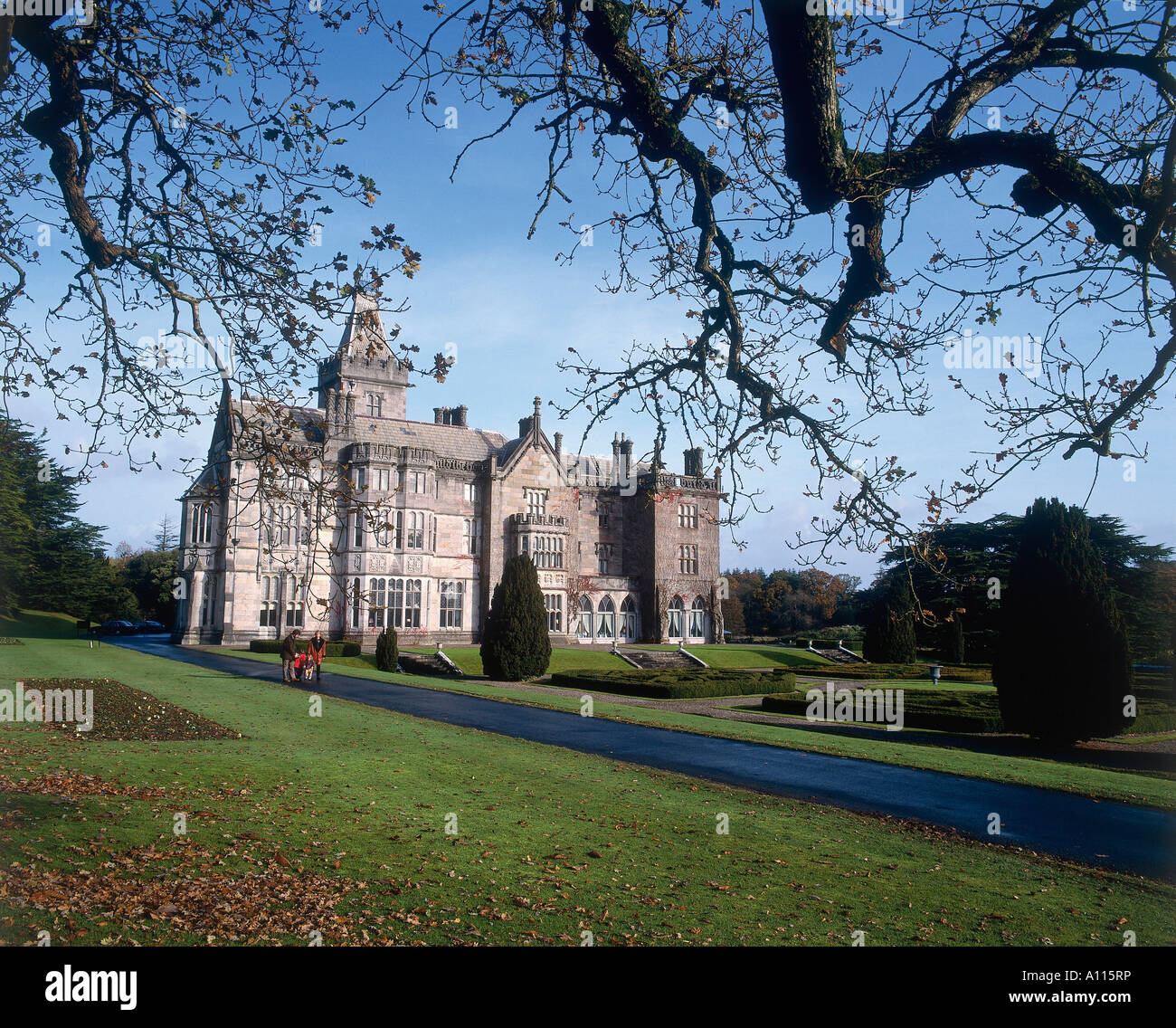 The exterior of the neo Gothic limestone mansion Adare Manor 1832 which