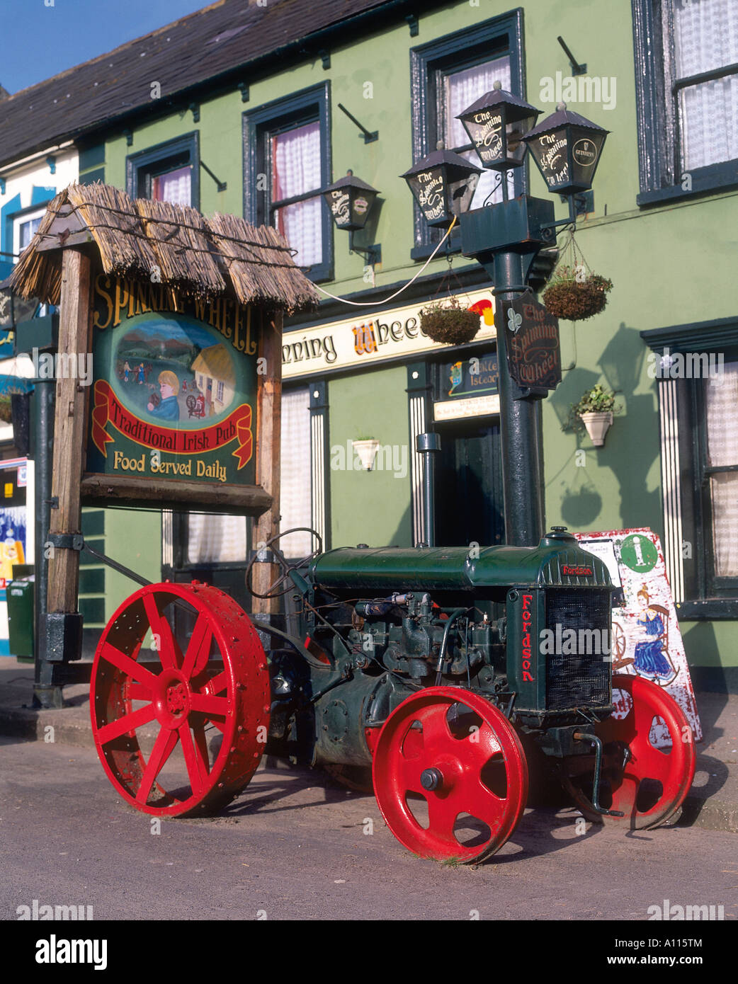 A tractor outside the front of the Spinning Wheel pub in
