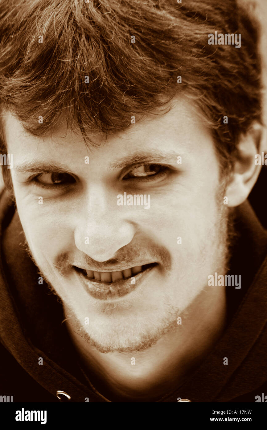 a black and white portrait of a young smiling man Stock Photo - Alamy
