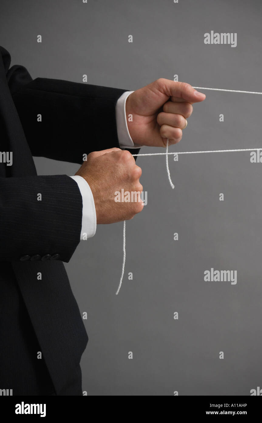 Man pulling strings hires stock photography and images Alamy
