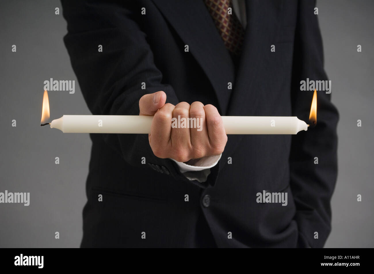 Burning the candle at both ends Stock Photo Alamy