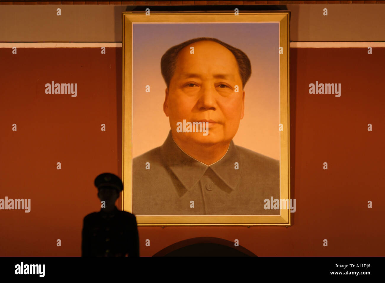 Silhouette of a soldier at the Tiananmen Gate of  Heavenly Peace,  Beijing China, Mao Zedong Portrait Stock Photo
