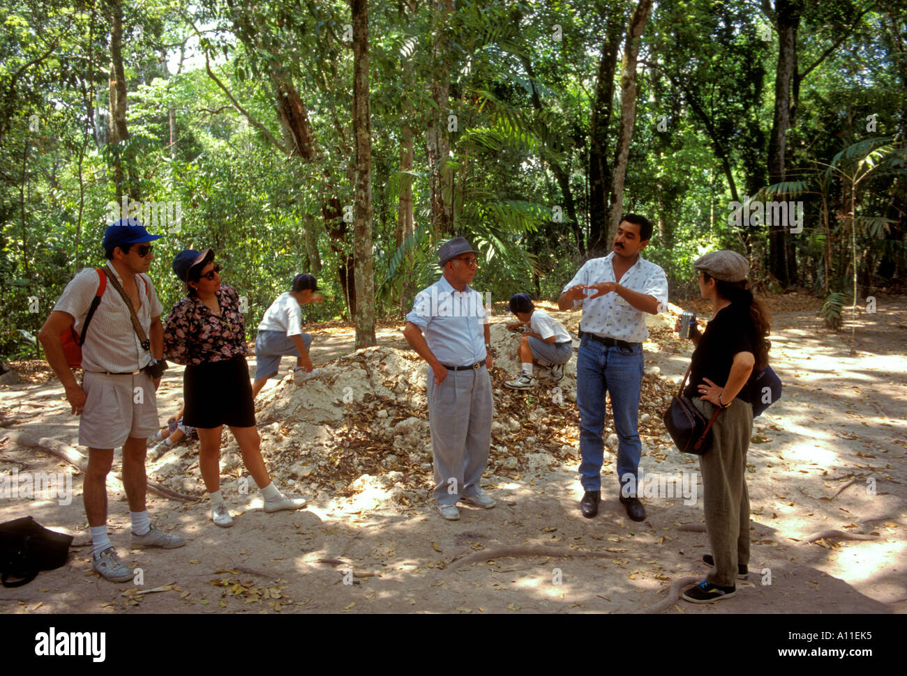 people, tourists, guide, guided tour, Tikal, Tikal National Park, El Peten, El Peten Department
