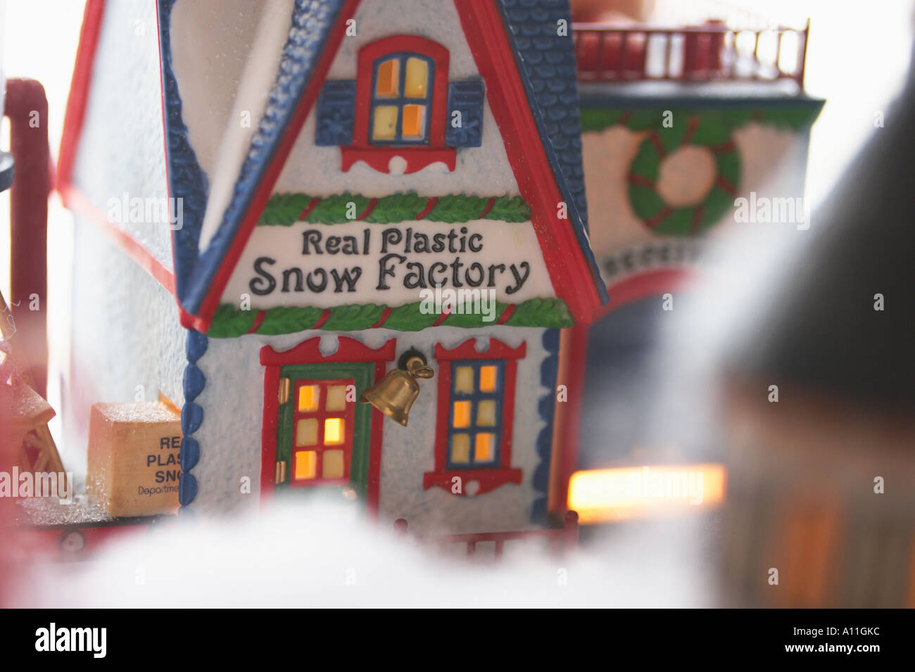 A Christmas village collectible figurine featuring victorian shops