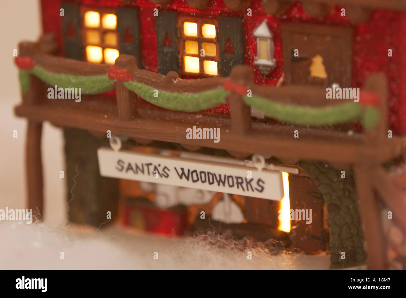 A Christmas village collectible figurine featuring victorian shops