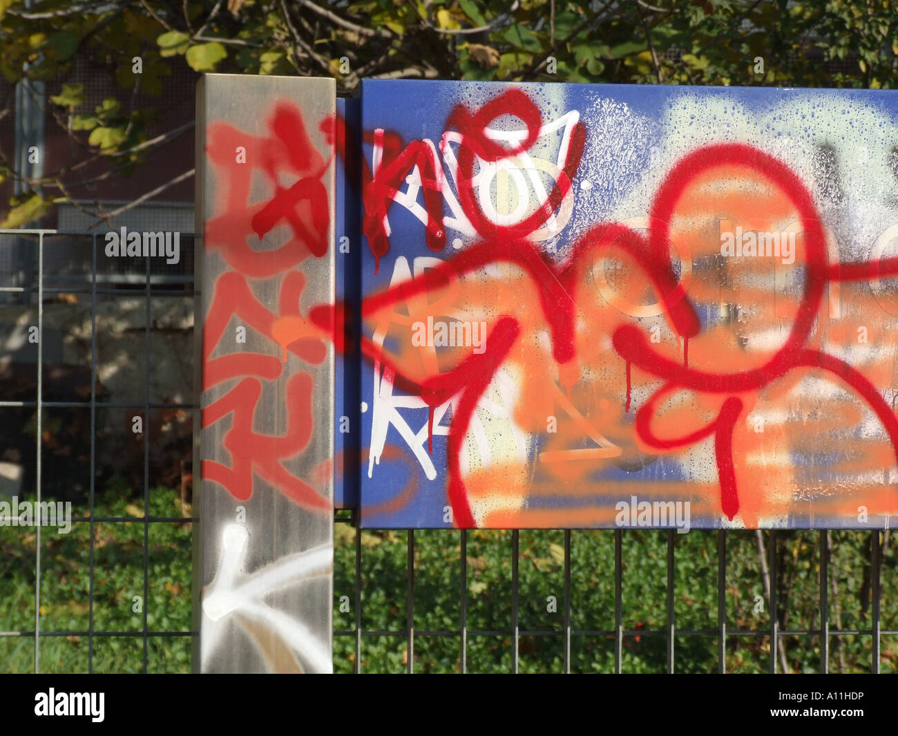 name plate board covered with graffiti Stock Photo