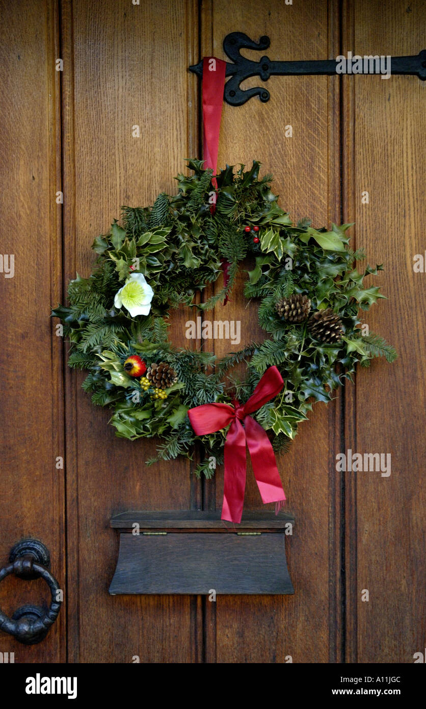 Wreath on a front door as a Christmas decoration Stock Photo