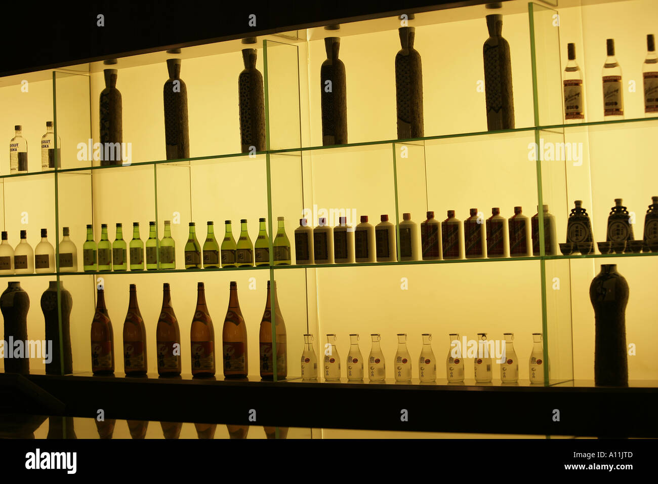 Bottles behind a bar Stock Photo Alamy
