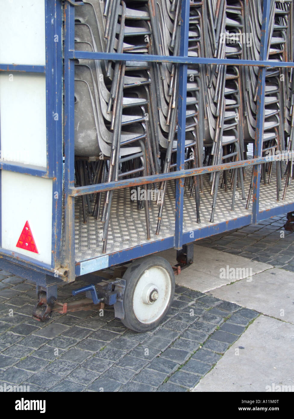 stacks of plastic chairs on lorry truck trailer Stock Photo Alamy