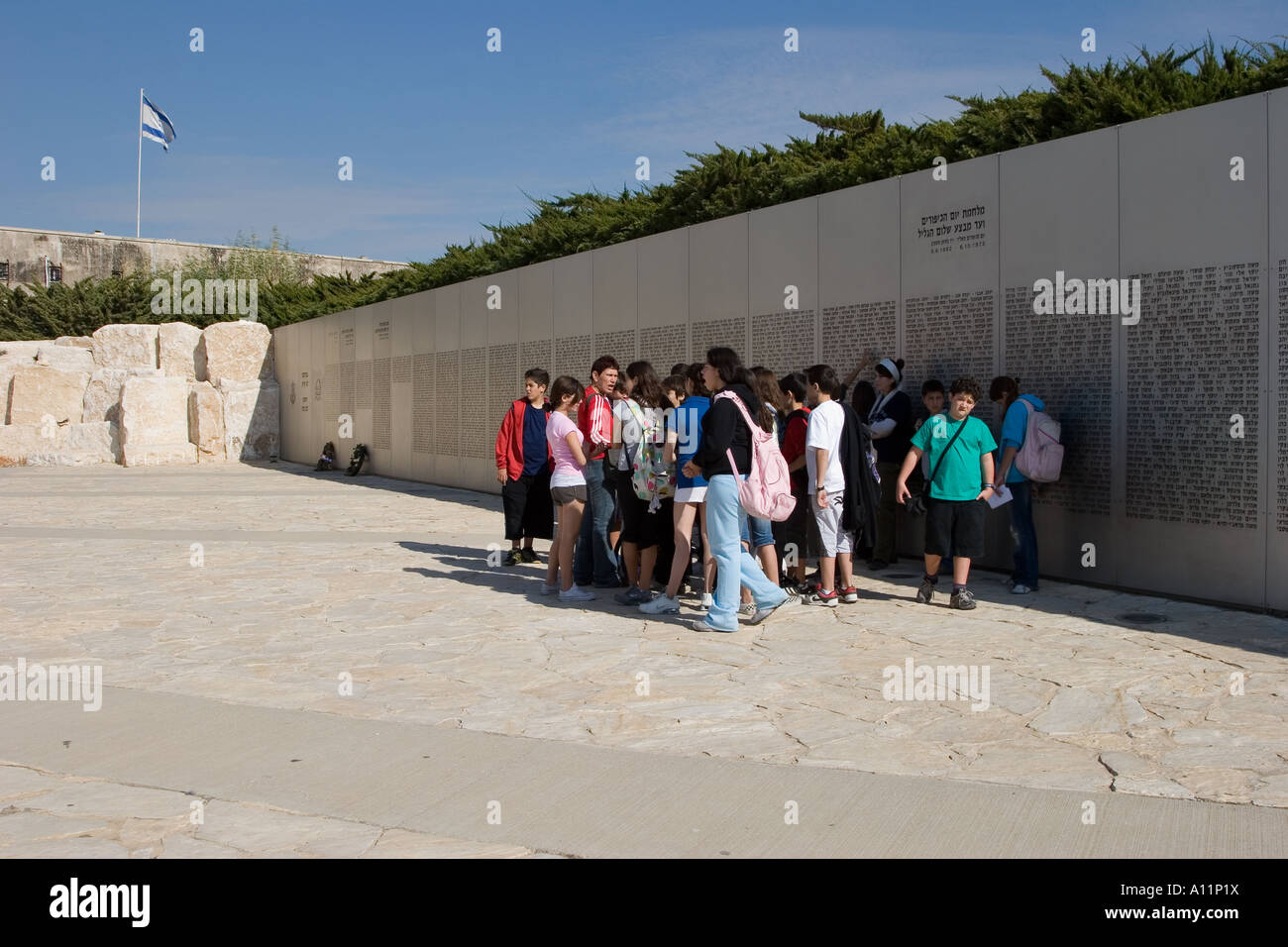 Stock Photo of Visitors at The Memorial Wall at Latrun Yad-Lashirion Armored Corps Memorial Museum in Israel Stock Photo