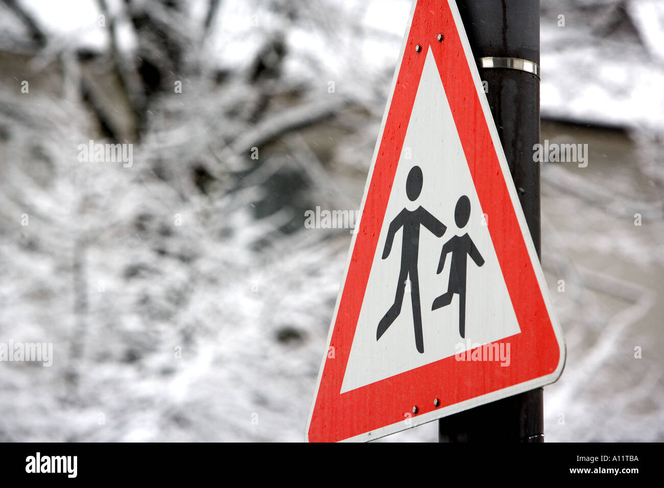 Children crossing warning sign in Germany Stock Photo