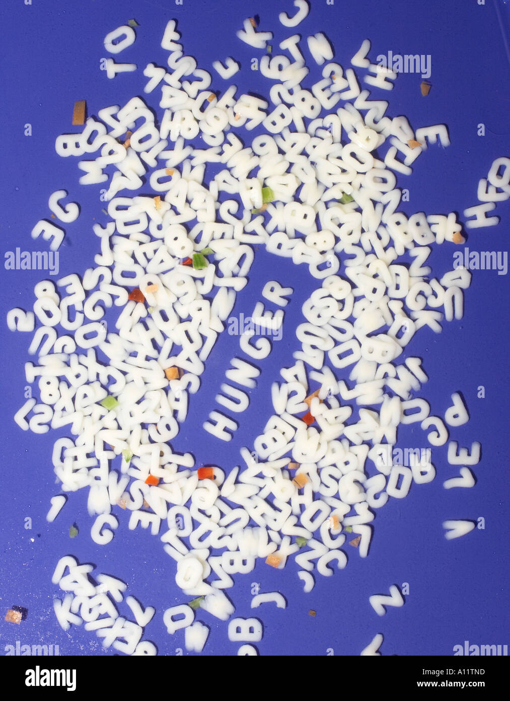 Buchstabensuppe mit schriftzug hunger alphabet hi-res stock photography ...