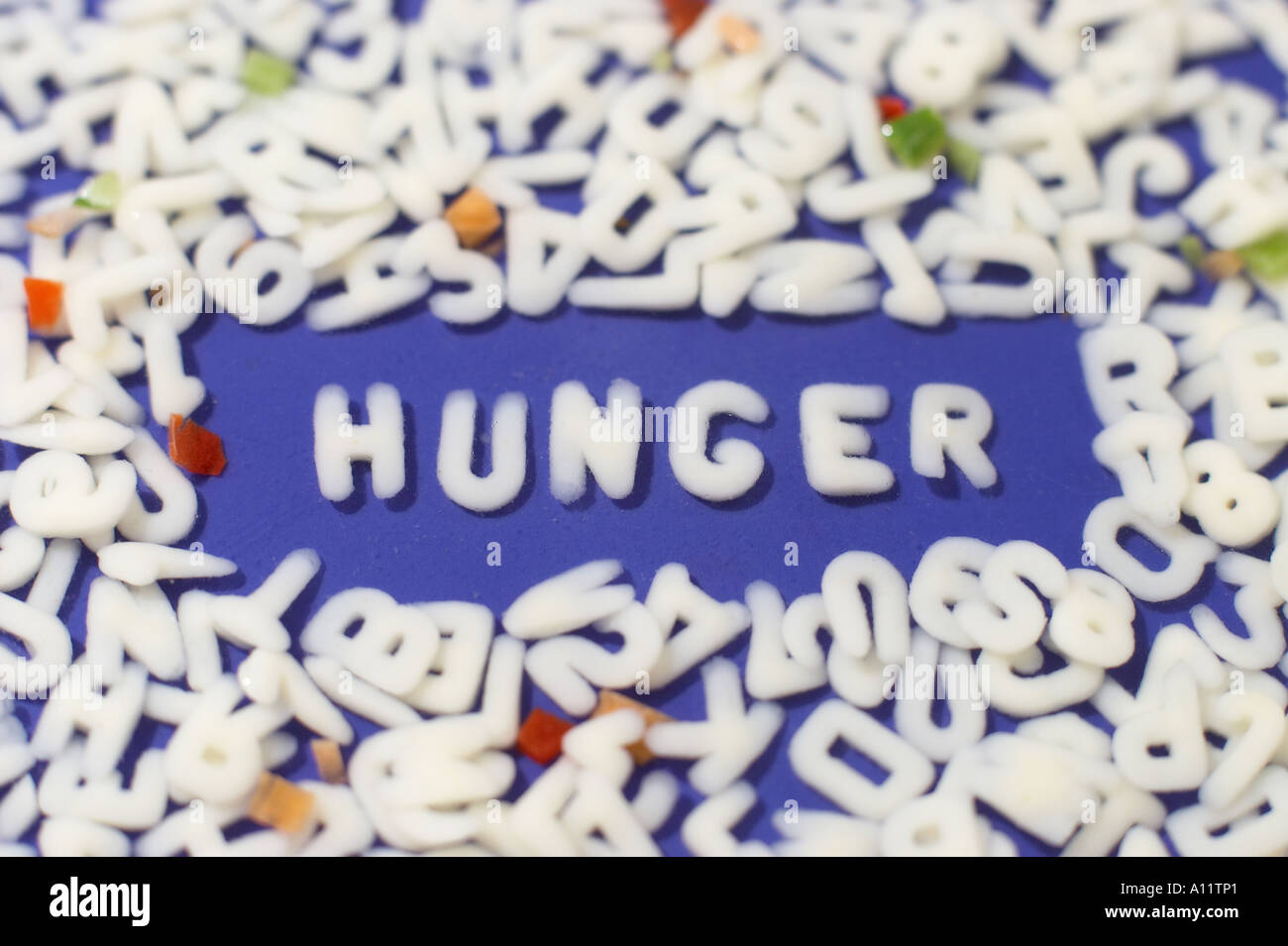 Buchstabensuppe mit schriftzug hunger alphabet hi-res stock photography ...