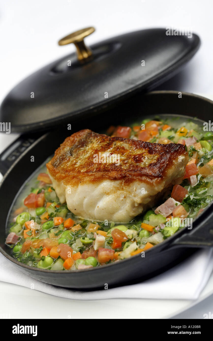 Cod Filet Broth Roasted fillet of cod with Parma ham and vegetable broth Stock Photo ...