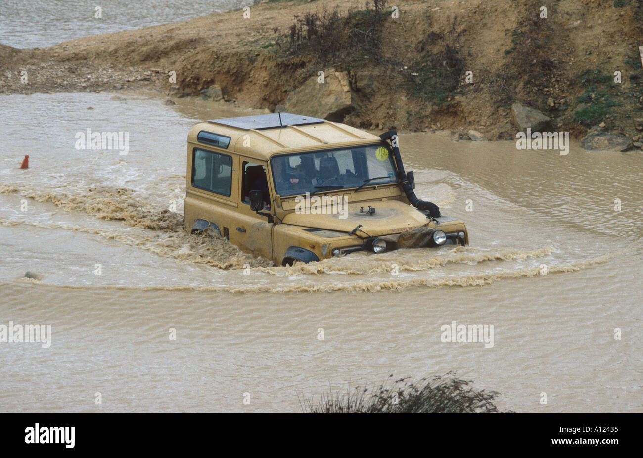 Land Rover 90 crossing deep water UK Stock Photo