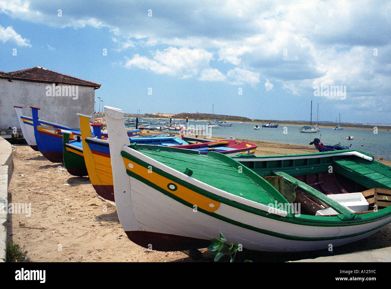 Fishing Boats near Lifeboat Station, Alvor, Algarve, Portugal Stock Photo