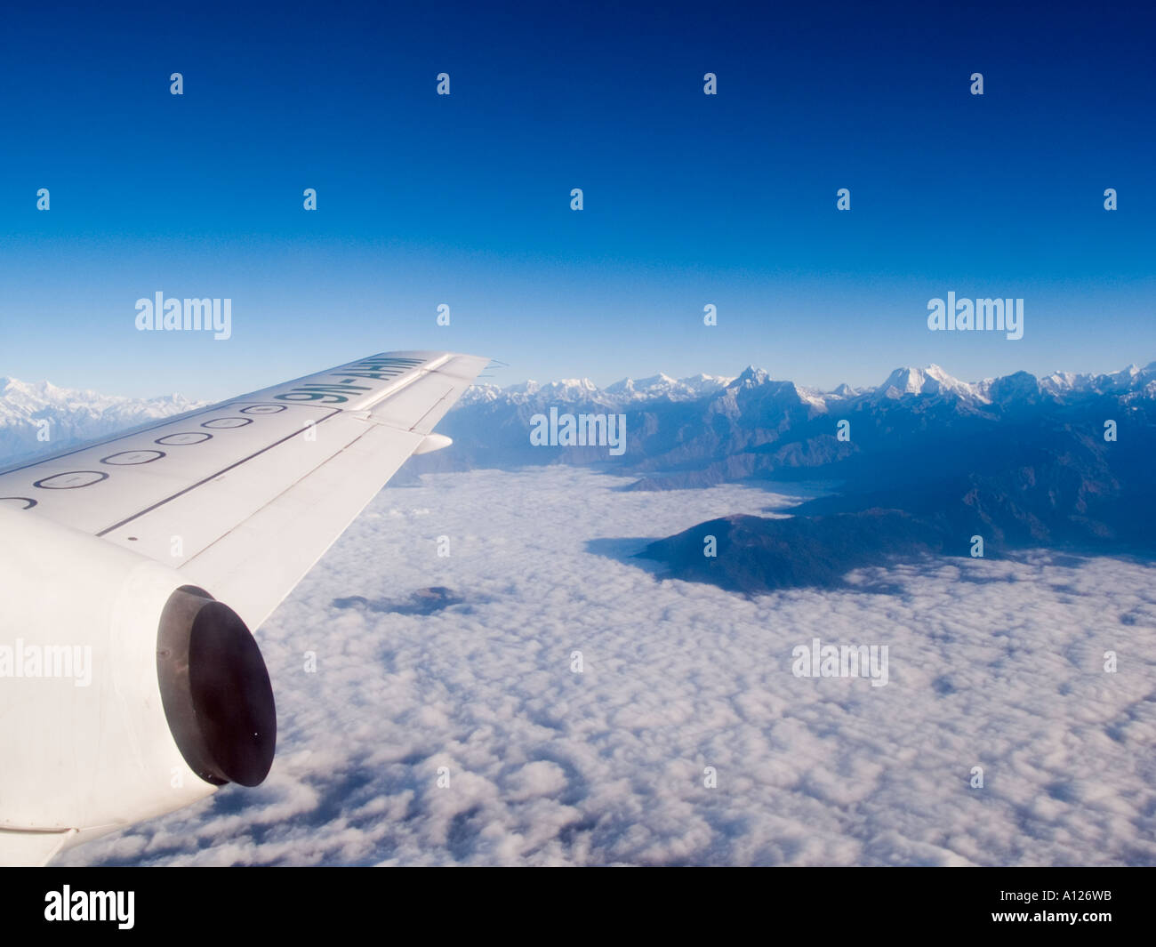 EVEREST FLIGHT above clouds in SAAB 340B by 'Yetti Airlines'  Nepal Asia Stock Photo