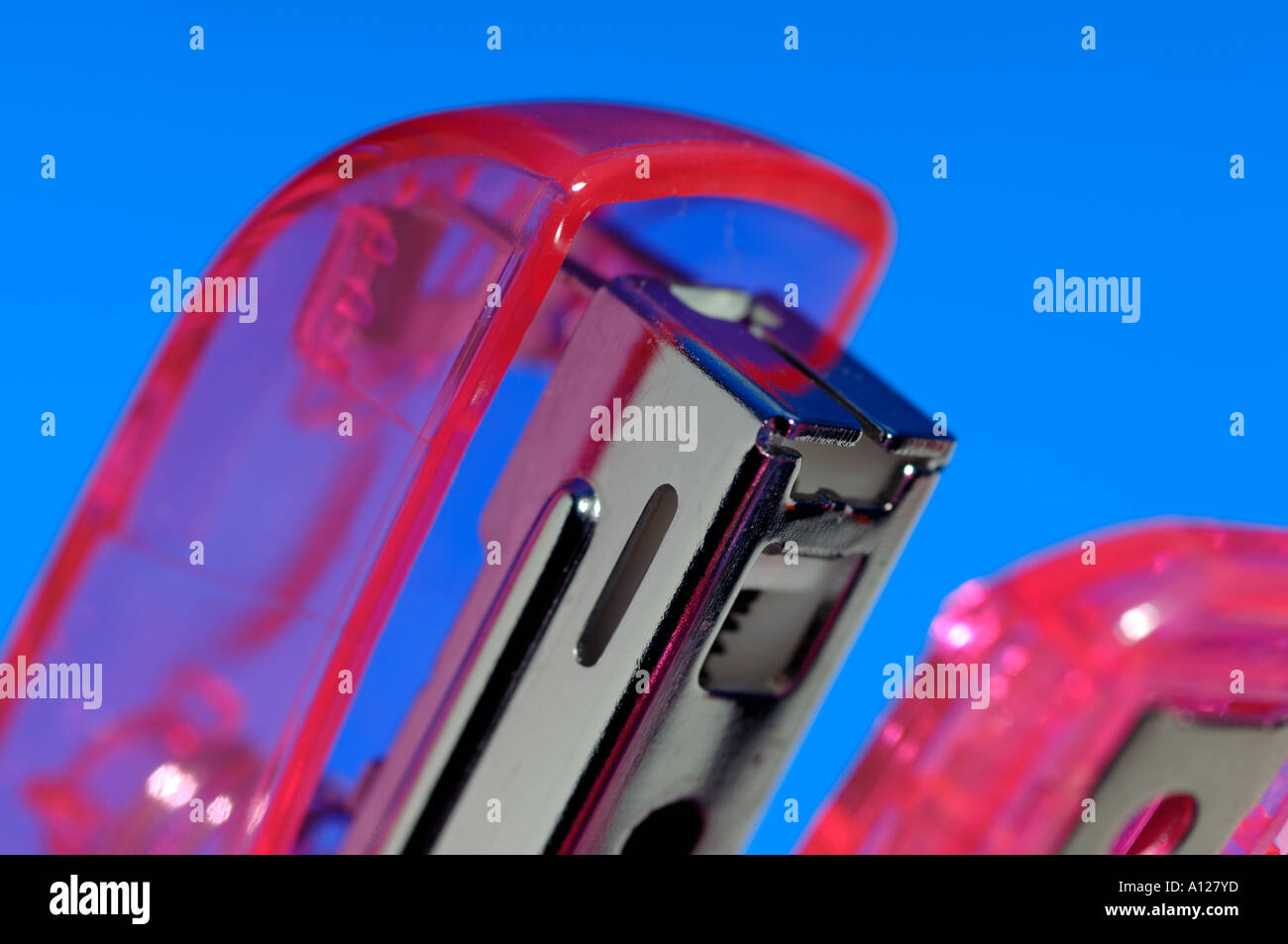Pink office stapler detail Stock Photo