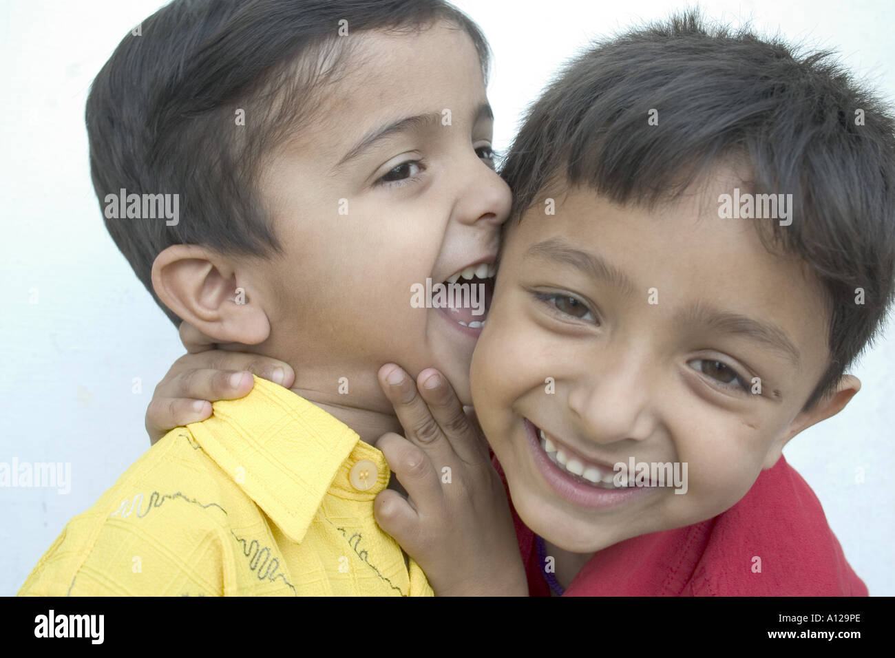 RSC74983 Two Indian Boys smiling laughing playing in India Stock Photo ...