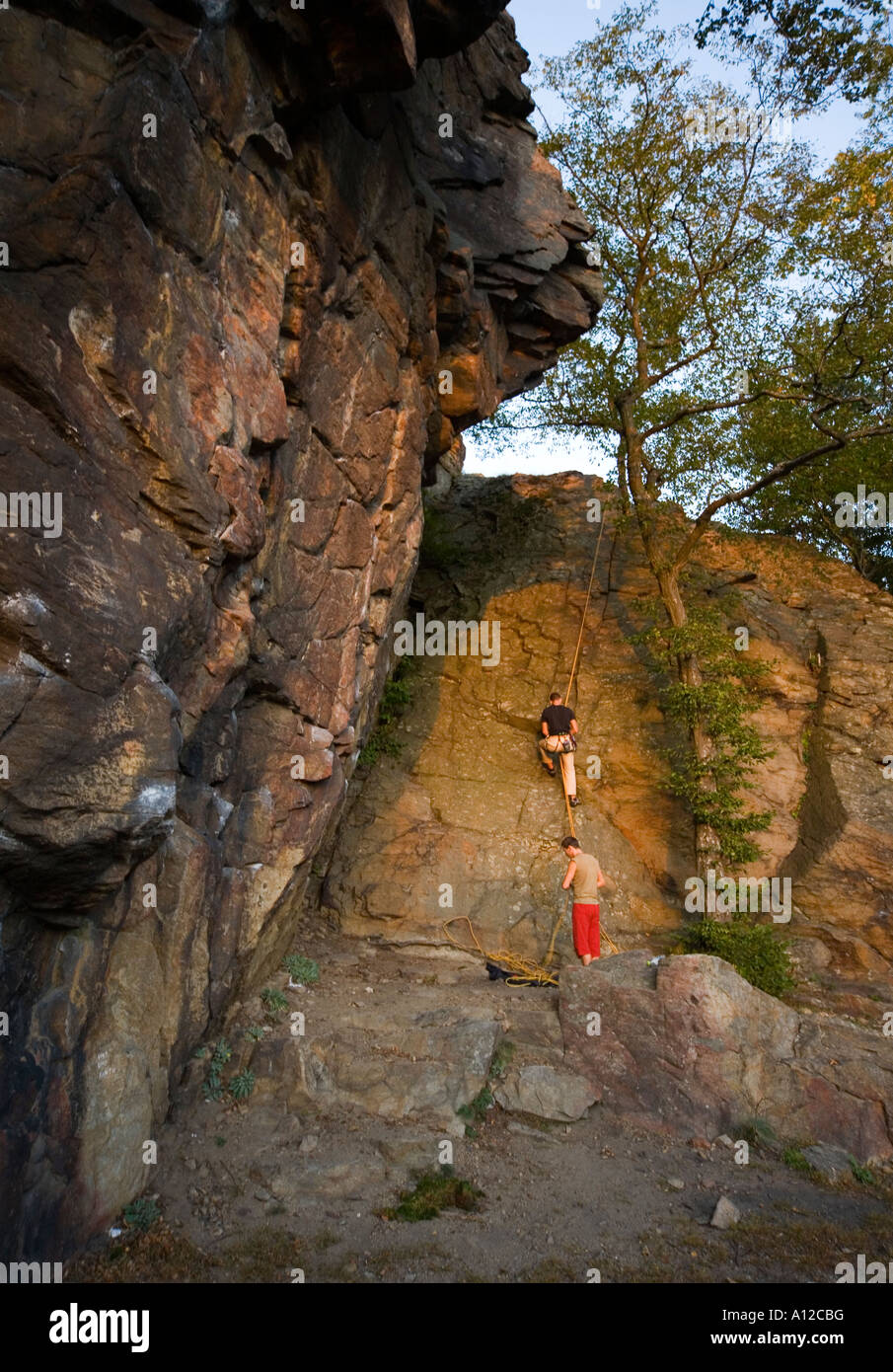 Man climbing a mountain hi-res stock photography and images - Alamy