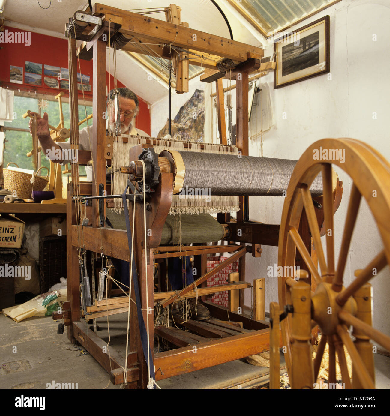 A weaver and his loom Stock Photo Alamy