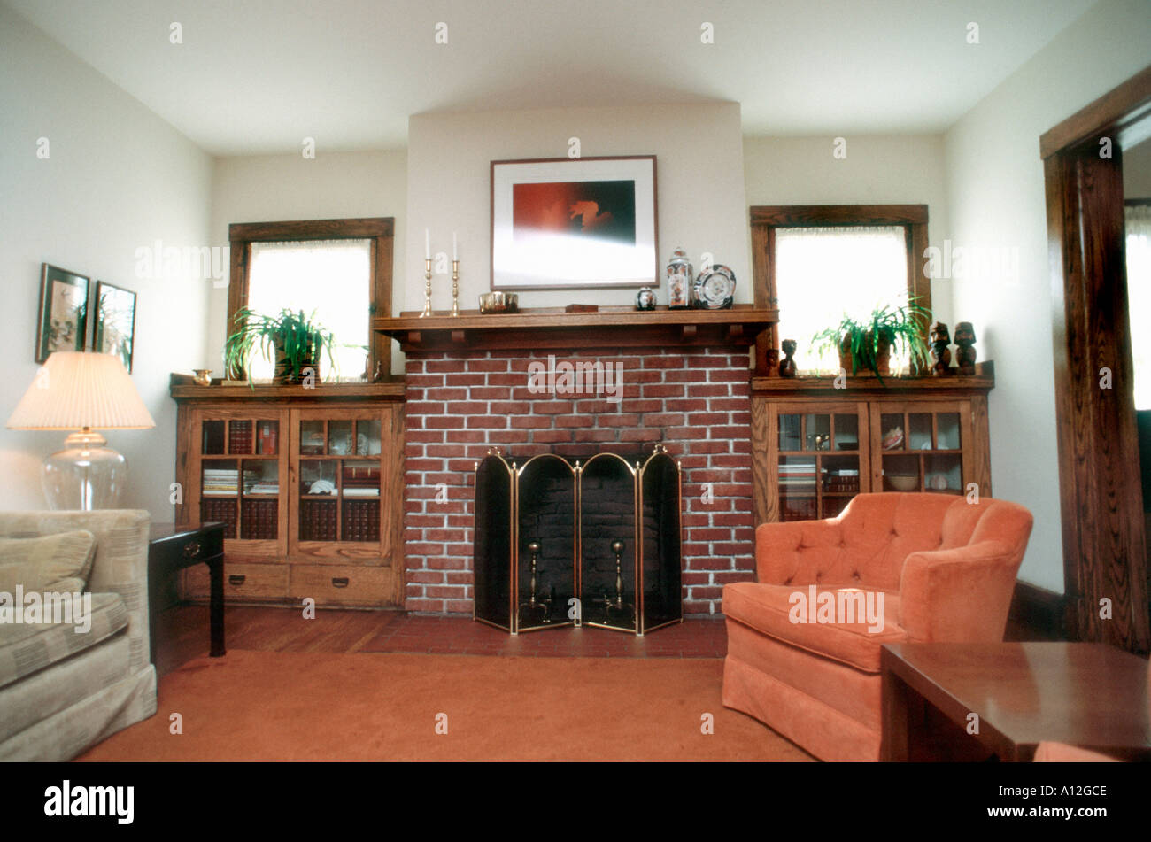 Investment USA American Homes 'Single Family House' Interior 1980s Living Room, Brick Fireplace, Home Stock Photo