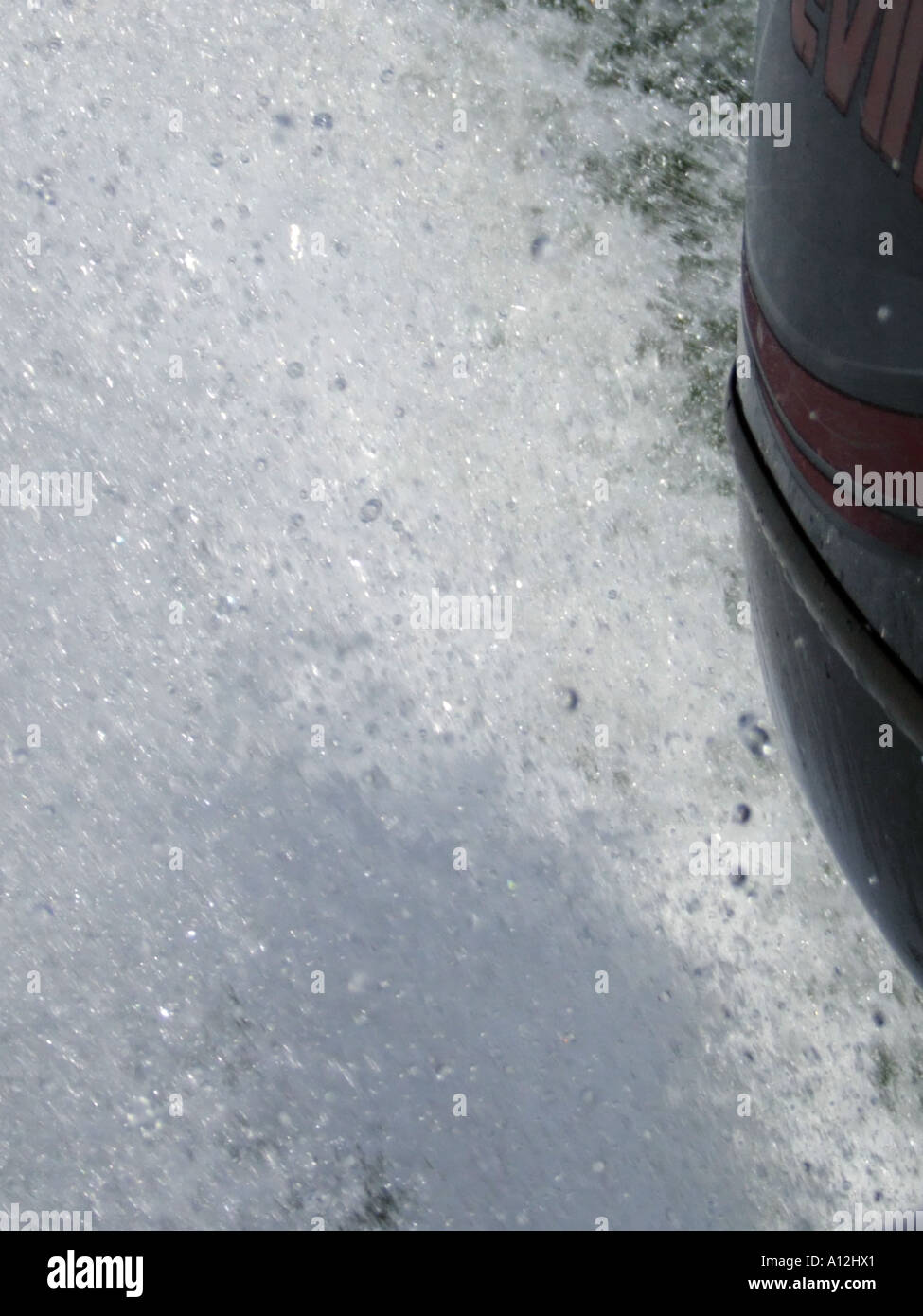 Water spray caused by a powerful outboard engine Stock Photo Alamy