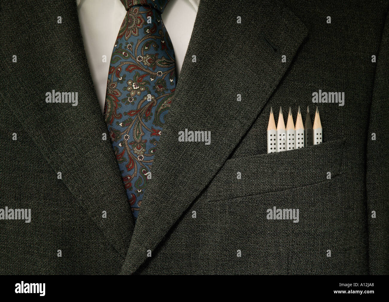 Mens suit jacket with six pencils in the top pocket Stock Photo